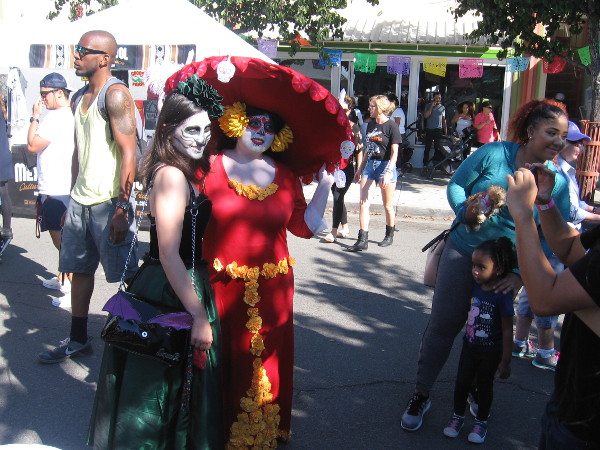 Many costumes celebrating Día de los Muertos (and also Halloween) could be seen about the fun North Park festival.
