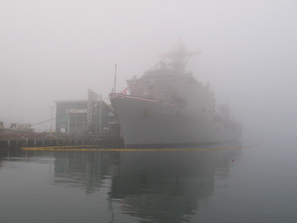 United States Navy ship USS Harpers Ferry (LSD-49) docked in the fog at Broadway Pier, awaiting public tours during Fleet Week this weekend.