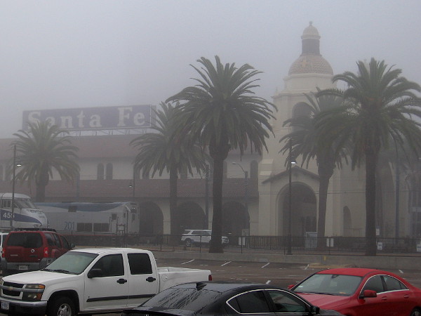 The iconic Santa Fe Depot in the fog, seen from the west.