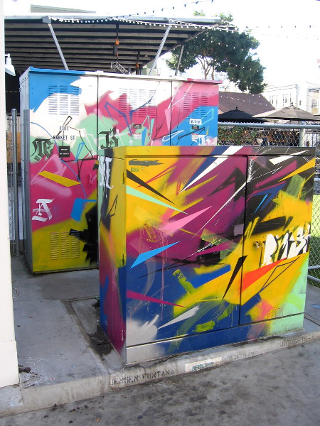 Colorfully painted utility boxes just outside Quartyard.