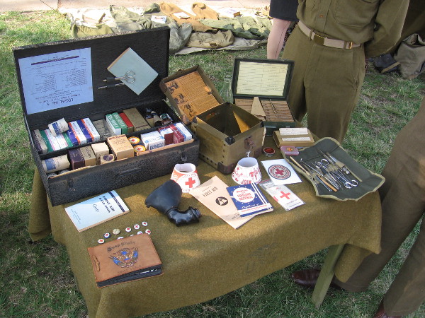 Medical items used by the American Red Cross, who aided suffering soldiers during wars of the 20th century.