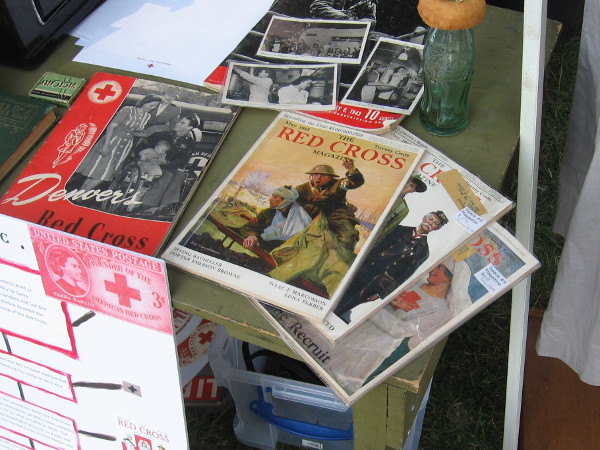 Ephemera on display include old issues of The Red Cross Magazine.