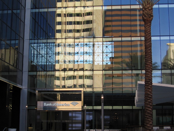 Complex reflection in the windows of the building at 701 B Street, which has undergone some upgrades.