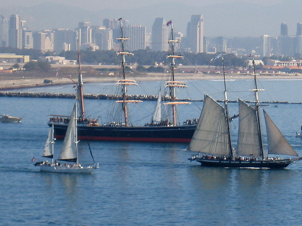 Two beautiful tall ships of the Maritime Museum of San Diego, Star of India and Californian, head out into the Pacific Ocean.