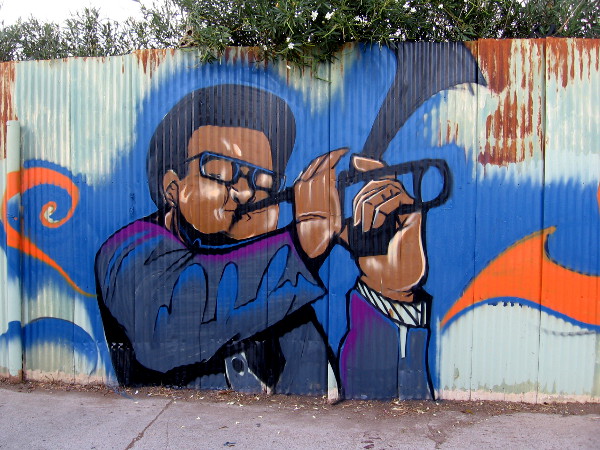 A neighbor in Logan Heights loves old school Jazz, so Fizix included this cool musician in the large mural.