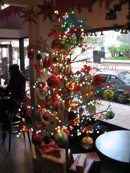 A bright, happy Christmas tree has appeared inside the Donut Bar.