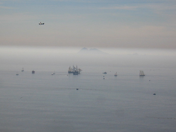 Light reflects from a passing plane. The Coronado Islands poke out of the haze. And the Star of India sails proudly on the open Pacific Ocean.