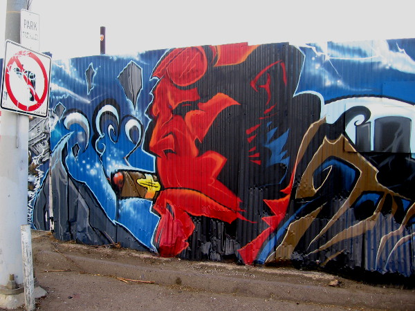 Hellboy street art by Fizix.