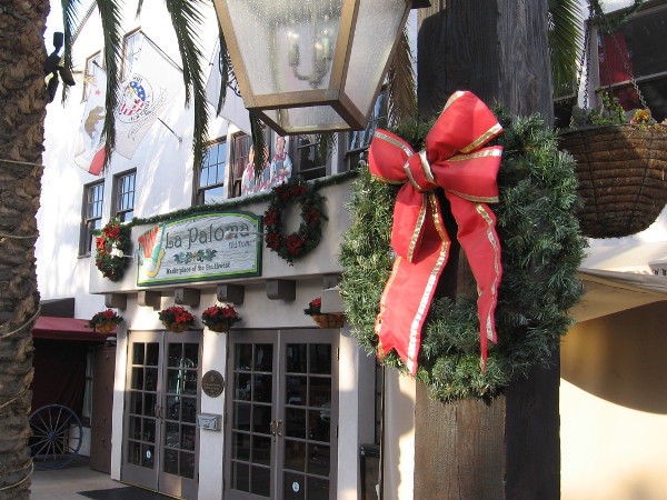 I discovered green and red wreaths at every turn as I walked about Old Town.
