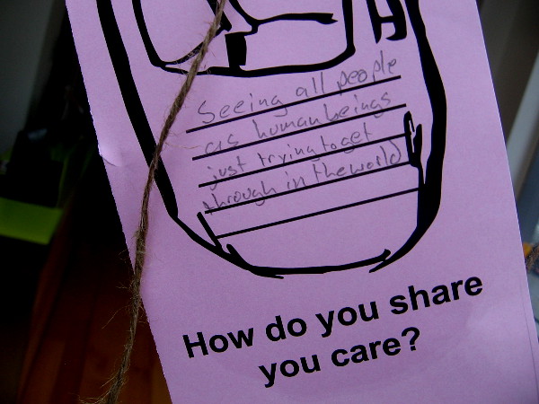 Seeing all people as human beings just trying to get through in the world.