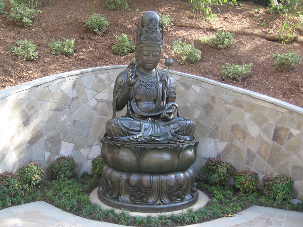 The large bronze Kannon Bosatsu represents the Japanese goddess of mercy.