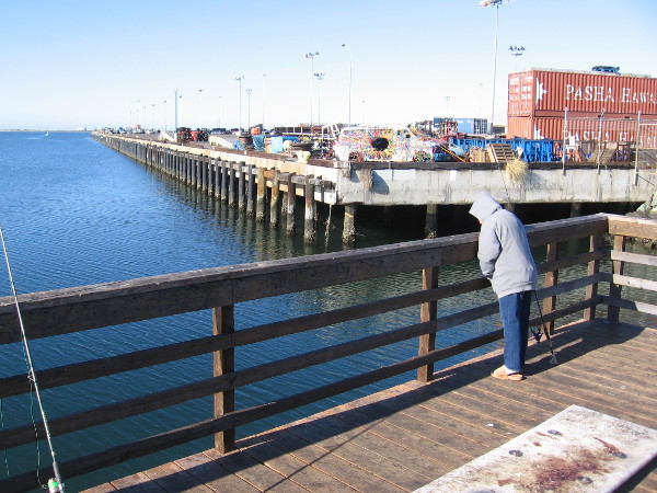 Fishing from the Pepper Park pier near public artwork commissioned by the Port of San Diego.