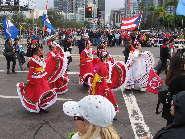 Beautifully swirling Mexican dresses delight the eye.