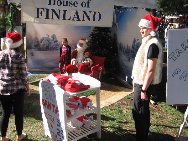Santa, a guest of the House of Finland, was checking to see if children have been good at Balboa Park's International Cottages.