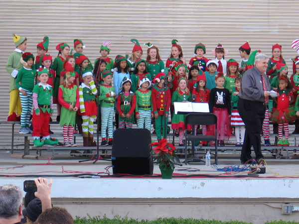 Second grade students from Dailard Elementary School fill Balboa Park with joyous song during 2018 Christmas on the Prado.