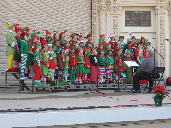 Young singers from Dailard Elementary School treat the crowd to fun holiday music.