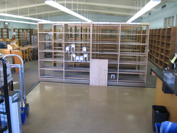 Empty shelves are all that's left in the old Mission Hill Library.