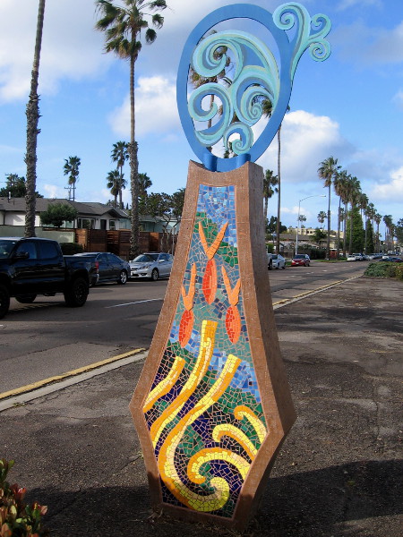 Closer photo of the beautiful mosaic sculpture titled Waves, created by artist Kim Emerson in 2002.