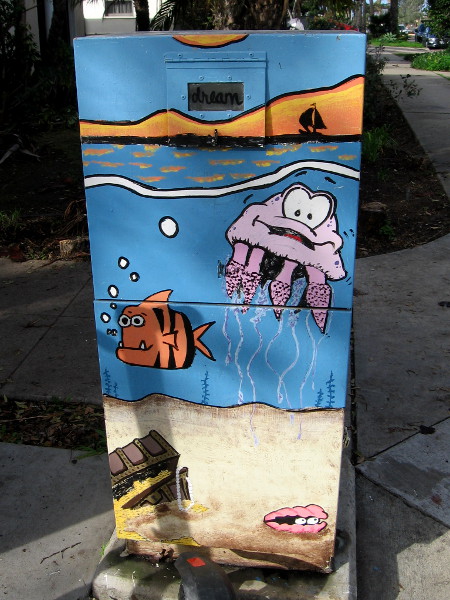 Sea creatures hang out near a sunken treasure chest.