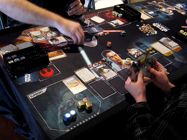 Players try out Star Wars Destiny, a dueling dice and card game.
