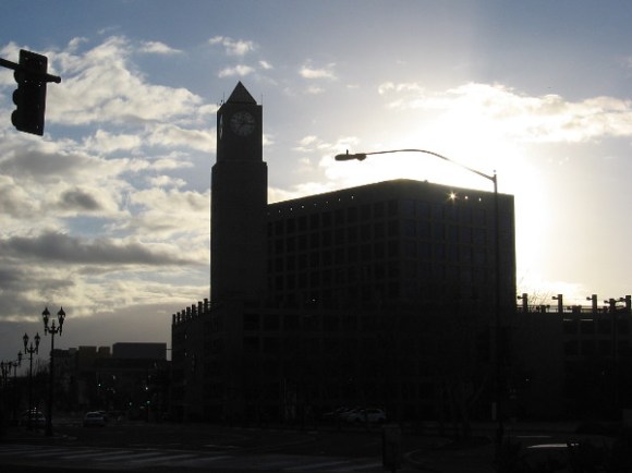 The sun will soon appear above the MTS building at 12th and Imperial.