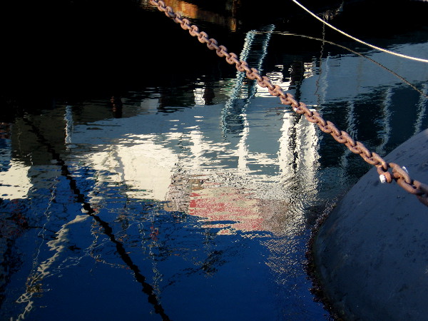 Reflection on the water near USS Dolphin of Steam Ferry Berkeley.