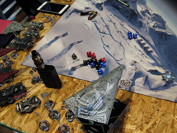 A cool game mat depicts the Star Wars ice planet Hoth.