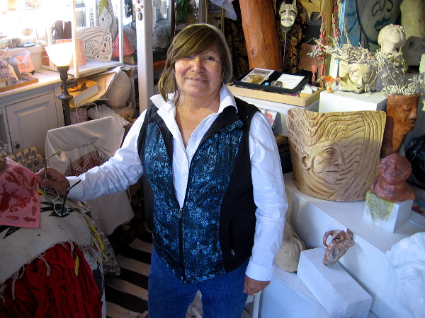 Sylvia Mejia, in Spanish Village Art Center's fantastic Studio 13, surrounded by her ceramic creations.