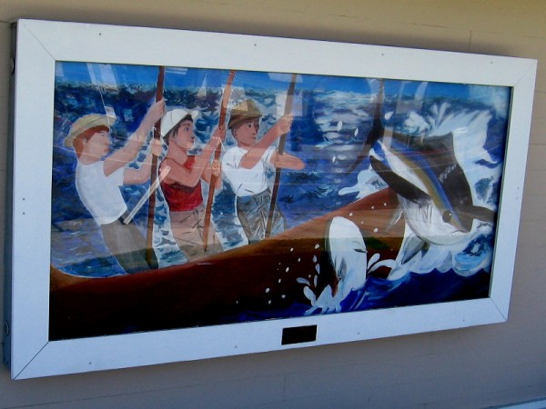 The Union Bank on the same corner has a colorful mural depicting fishermen near its entrance.