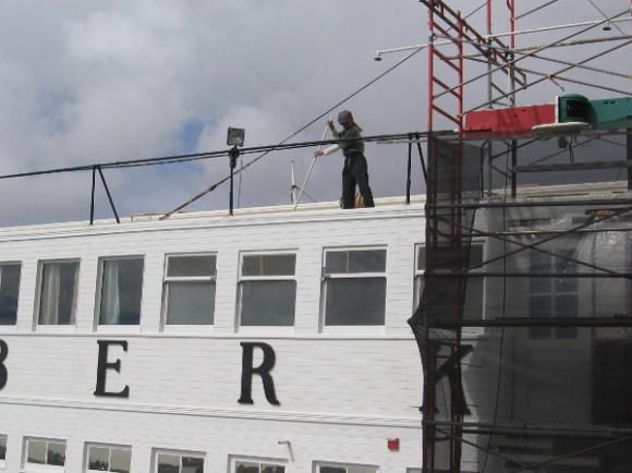 Another volunteer cleans the top of Steam Ferry Berkeley. Good progress is being made on this historic ship's exterior restoration!