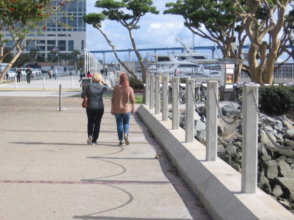 Walking along.