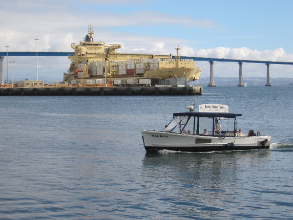 A water taxi comes in from Coronado. That huge yellow Dole Atlantic ship is loading containers at the Tenth Avenue Marine Terminal.