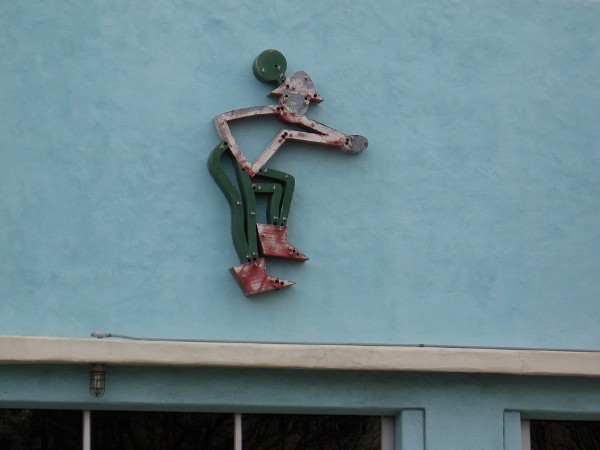 Peculiar figure above the front windows of Architectural Salvage.