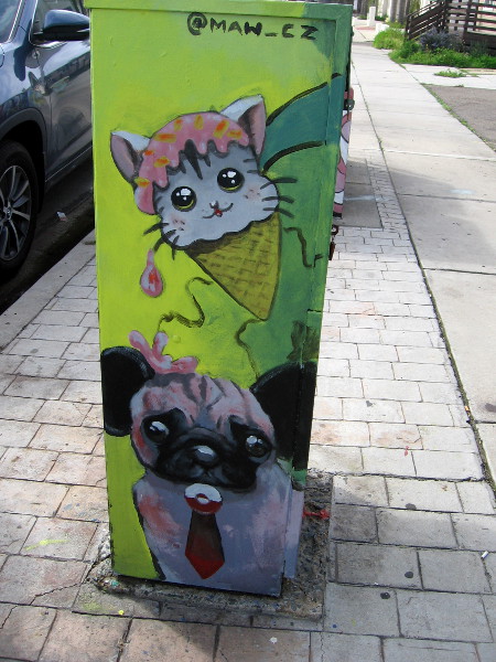 An ice cream cone cat drips on a tie-wearing dog! @MAW_CZ