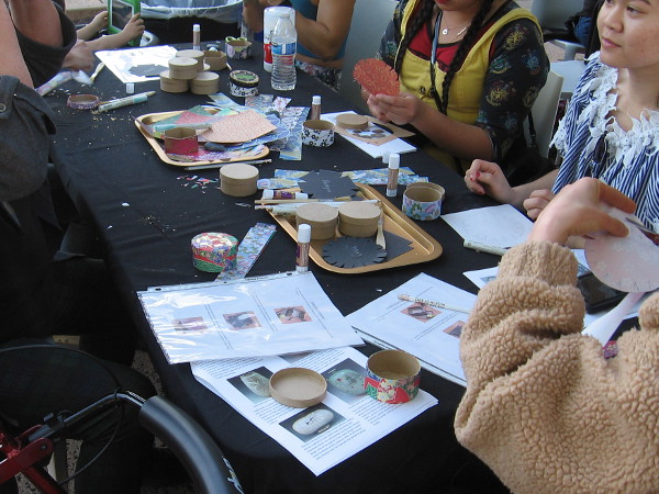 Even more art was being produced by lots of creative people at this table.