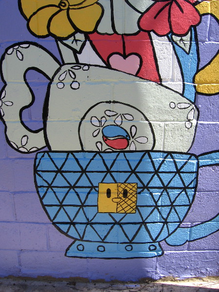 The colorful mural contains diverse symbols that hold special meaning for the artist.