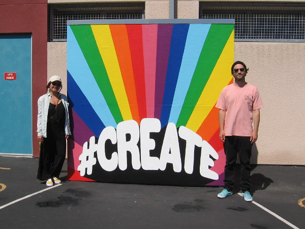 Thao Huynh and Kolten French of Mindful Murals encourage school kids to #CREATE with a super colorful interactive mural!