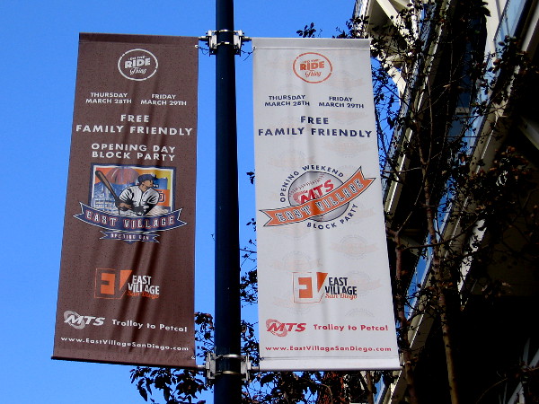The first street lamp banners to go up promote the free, family friendly Opening Day Block Party. The annual event will take place Thursday and Friday next week in East Village.