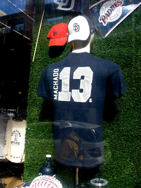 A new Manny Machado shirt is now on display in a window of the Padres Team Store.
