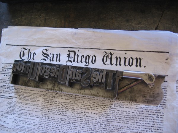 A demonstration of assembled type and the finished impression.