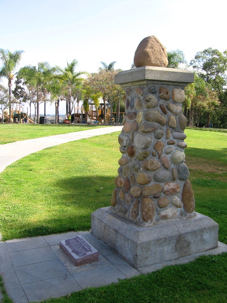 A cobblestone post at the entrance to Trolley Barn Park.