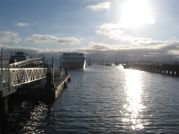 Inspiration Hornblower heads out into San Diego Bay near the Grape Street Pier on an early Friday evening.
