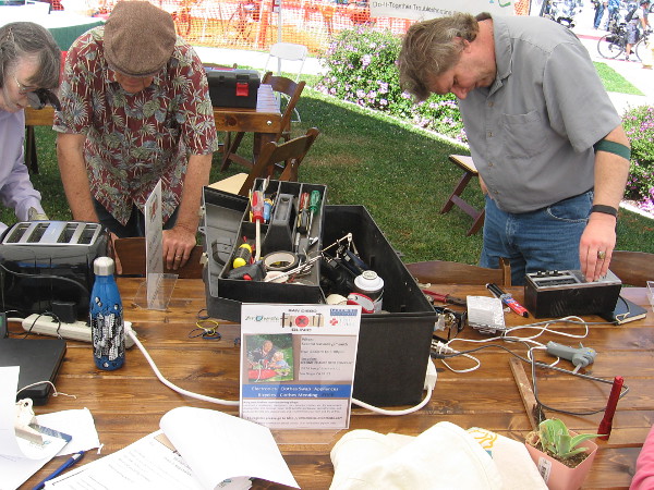 The San Diego Fixit Clinic had a table at the event. No need to throw certain things away. They repair many broken items for free!