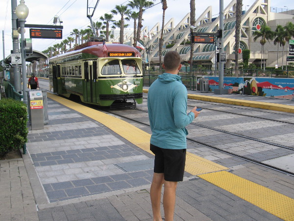 A restored PCC streetcar of the Silver Line arrives at the Convention Center trolley station.