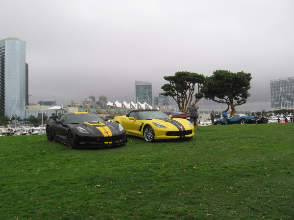 Cool cars under overcast skies.
