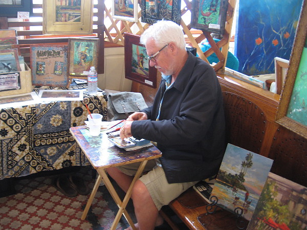 Norm Daniels was getting started on a new piece. He does a lot of plein air painting. His website is NormHere.com