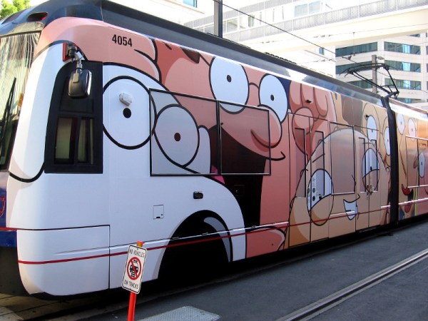 Family Guy characters on one side of the Animation Domination trolley wrap.