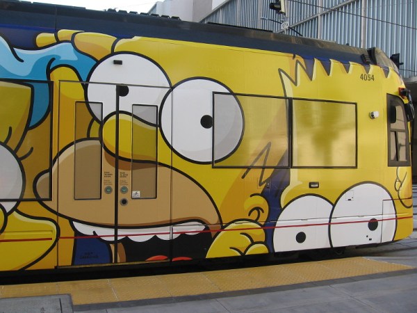 Homer and Bart Simpson on a 2019 Comic-Con trolley!