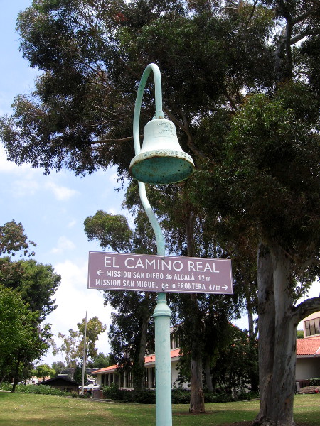 North of the library, at the west edge of Friendship Park stands an El Camino Real bell, donated by the City of Chula Vista, County of San Diego, and California Federation of Women's Clubs.