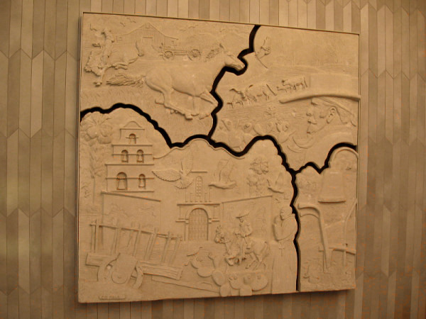 The panel on the left. It depicts early San Diego history, including Mission San Diego de Alcalá and the ranchos.